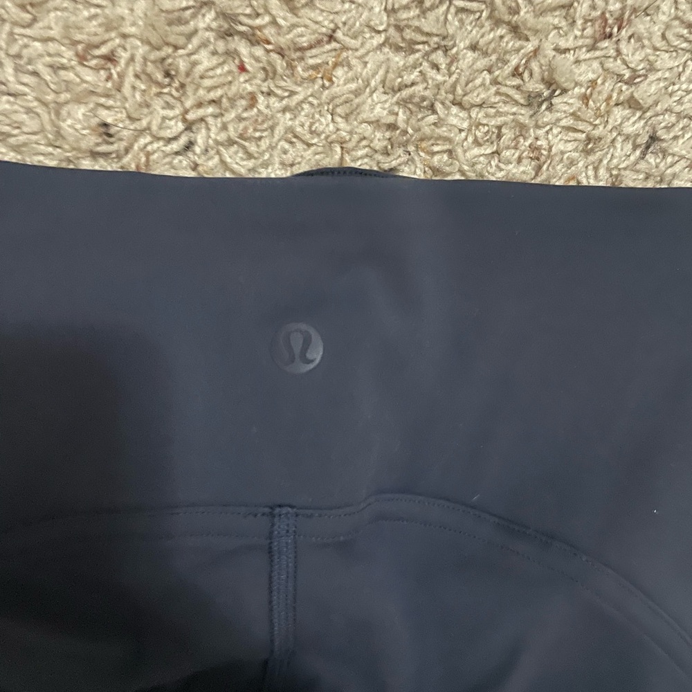 Size 4 navy blue lululemon leggings- Never worn! Perfect condition!